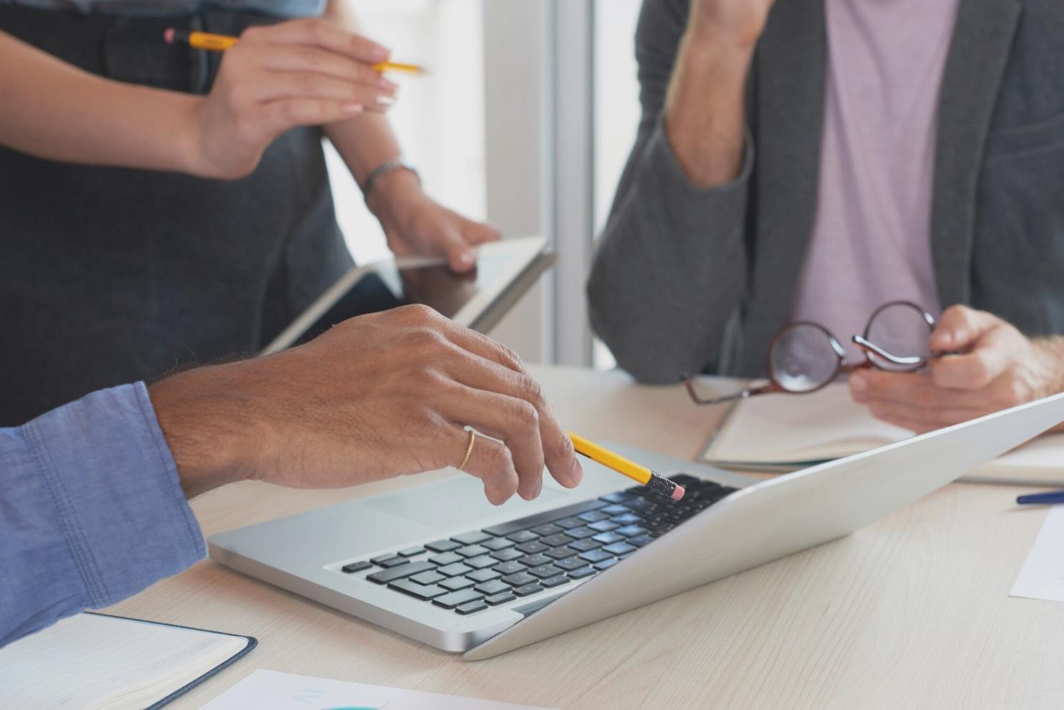 Students working together on budget planning exercises during interactive workshop session